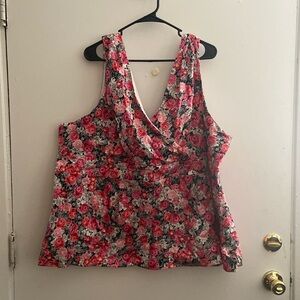 Pink and white Torrid ‘Skulls and Flowers ‘ babydoll tank. Size 4